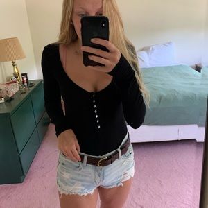 Black ribbed body suit. Low cut